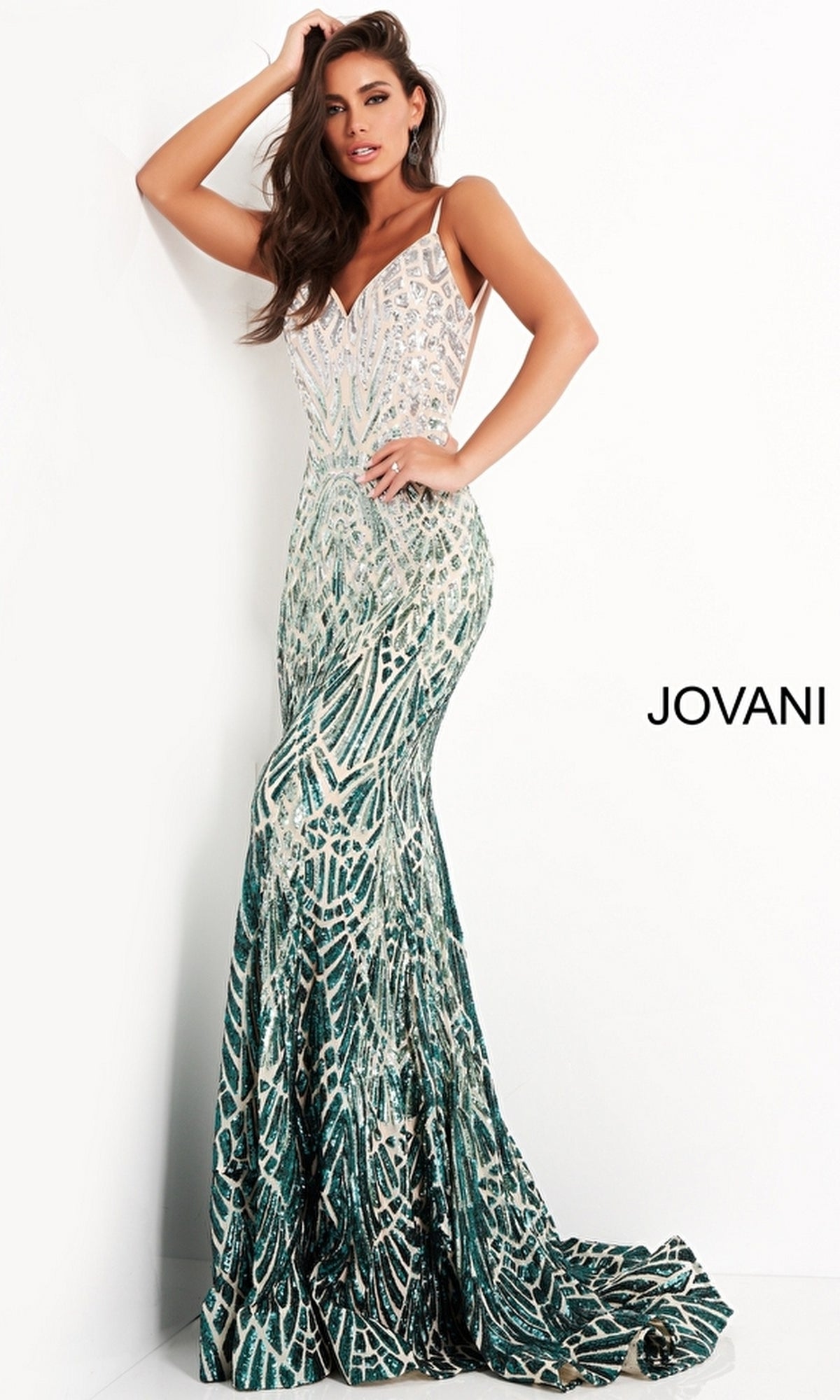 A woman poses in the Jovani 06450 Sequin-Print Long Prom Dress, a sleeveless, fitted floor-length gown with a beaded bodice and silver/green patterned skirt, blending elegance with modern style.